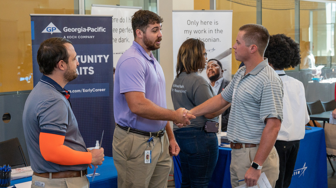 Students and employers at career fair